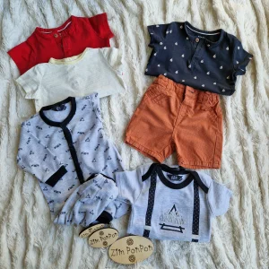 Lot soleil 9 mois , pyjama leger , short orange , un body , tee shirt jaune a rayures tee shirt rouge et tee shirt noir a motif blanc