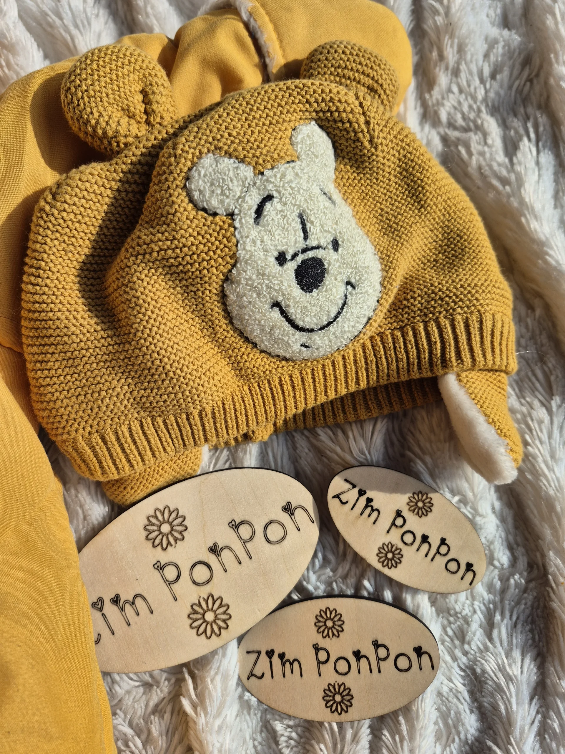 Combinaison Winnie l'Ourson 9 mois bonnet avec visage de winnie l'ourson jaune et beige